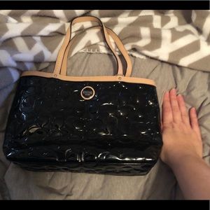 Black and Tan faux leather Coach tote